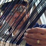 "We are able to make a direct replacement for plastic made from petroleum chemicals.“  Michael Biddle of MBA Polymers inspects strands of recycled raw plastic.